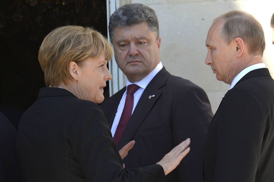 Angela Merkel, Petro Poroschenko und Wladimir Putin
