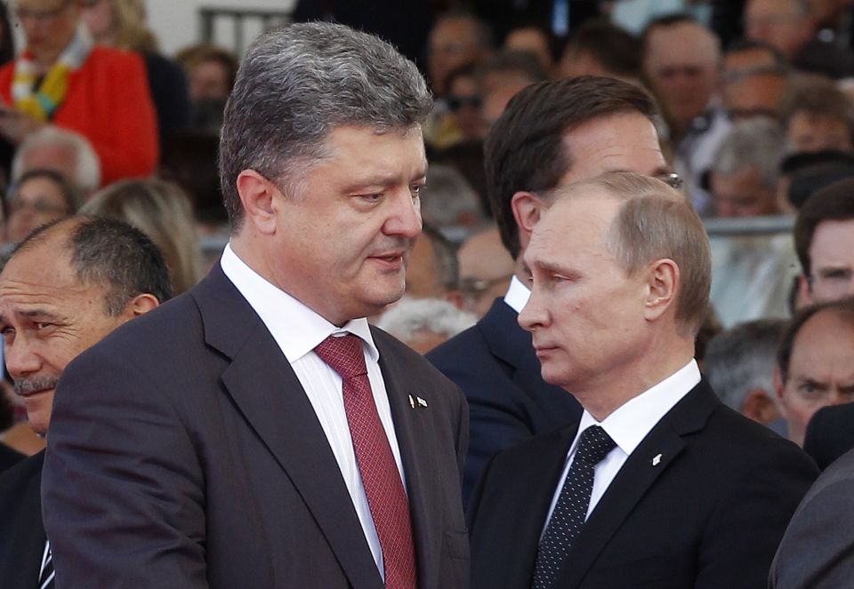 Pjotr Poroschenko und Wladimir Putin im Juni