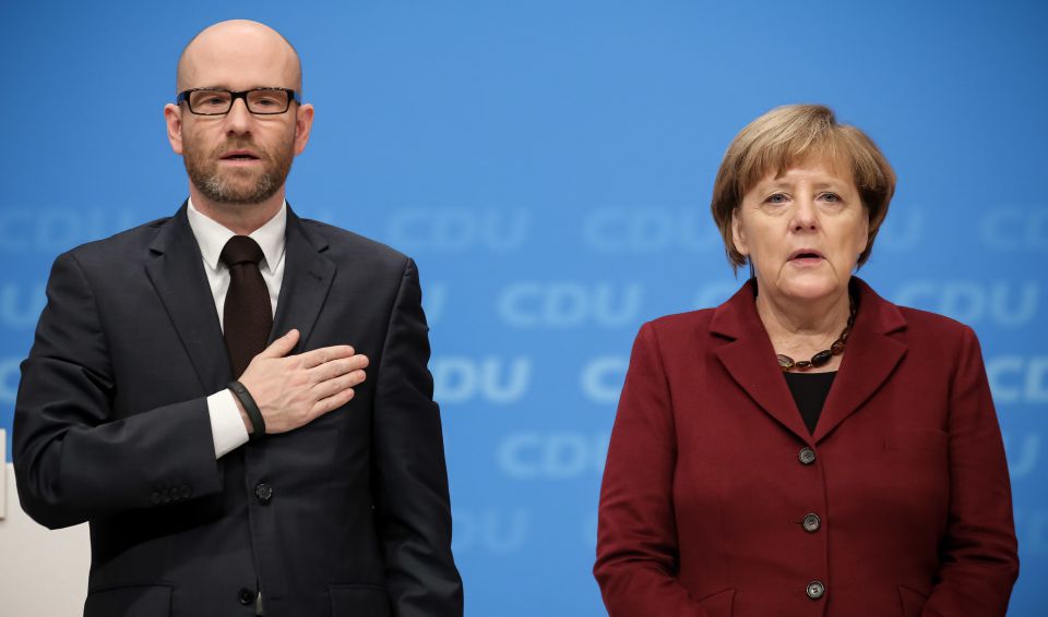 Tauber und Merkel