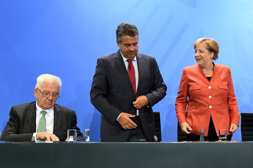 Baden-Württembergs Ministerpräsident Winfried Kretschmann (Grüne), Bundesaußenminister Sigmar Gabriel (SPD) und Bundeskanzlerin Angela Merkel (CDU)