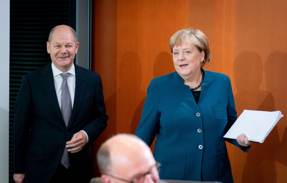 Olaf Scholz (SPD) und Angela Merkel (CDU)