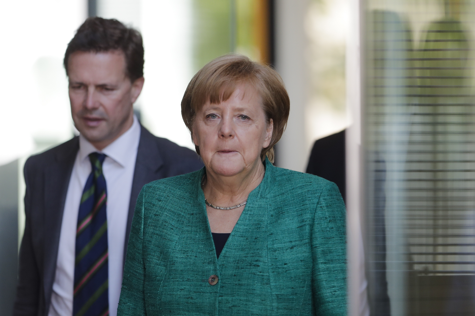 Angela Merkel (CDU) und Steffen Seibert