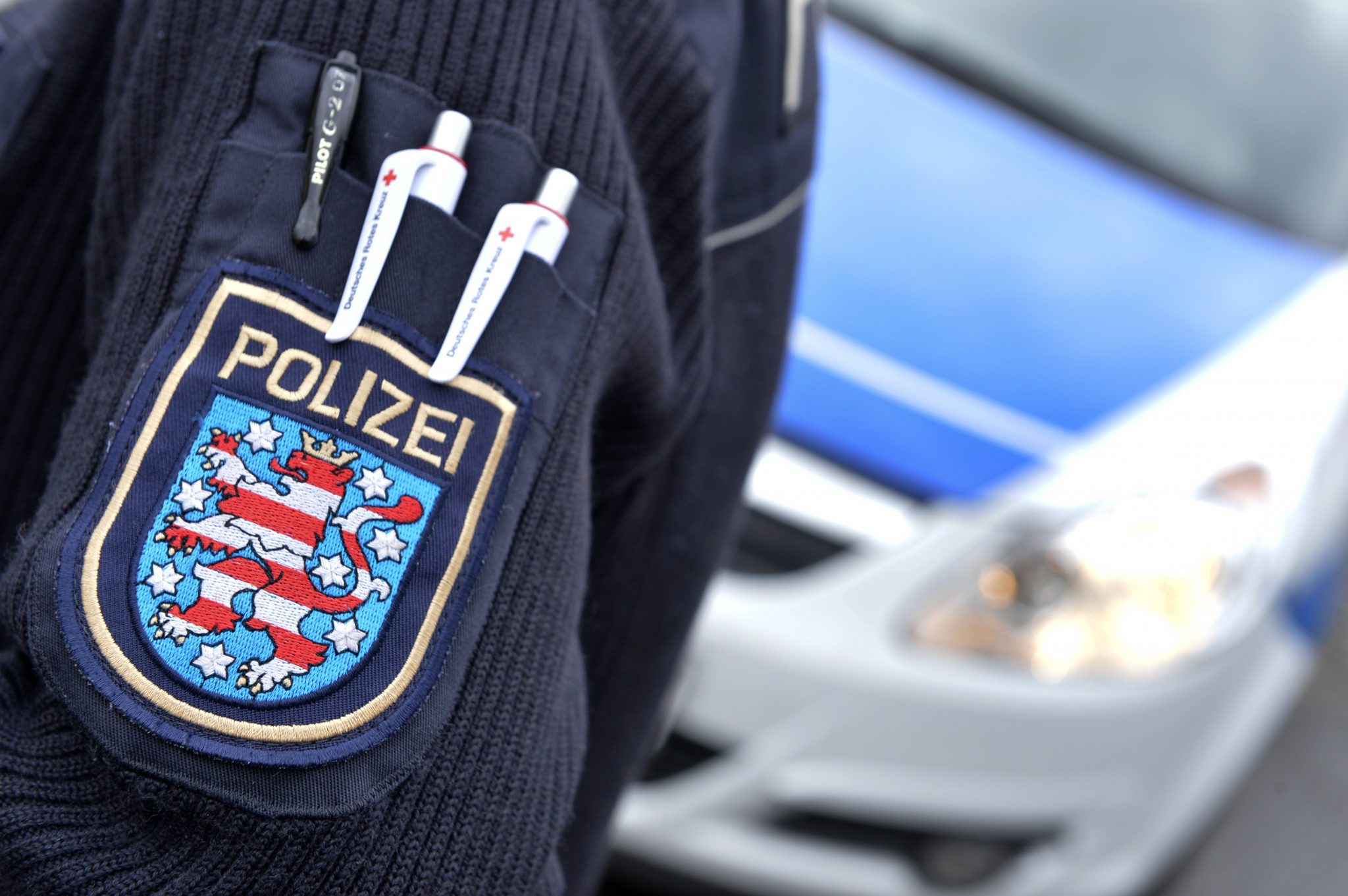 Thüringens Wappen auf einer Polizeiuniform Foto: picture alliance/Volkmar Heinz/dpa-Zentralbild/ZB