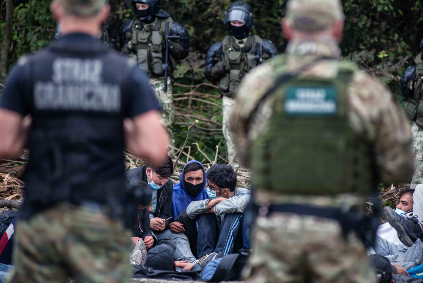 Migranten an der polnisch-weißrussischen Grenze Foto: picture alliance / ZUMAPRESS.com | Attila Husejnow