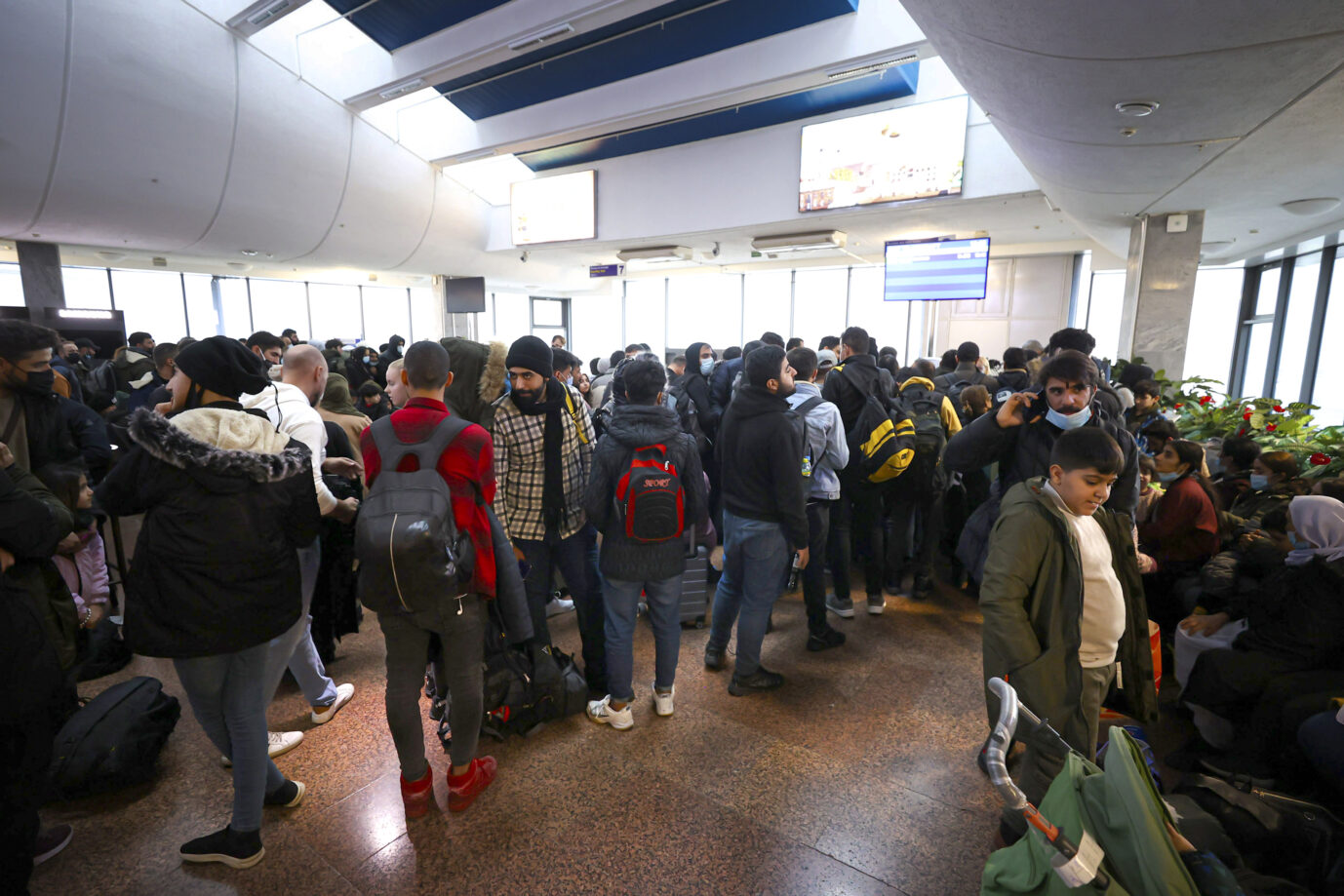 Grenz-Migranten im Flughafen von Minsk