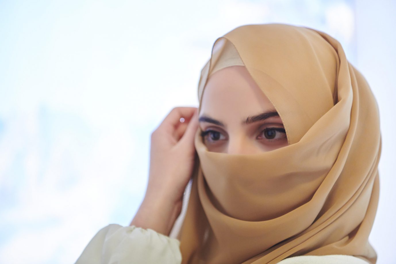 Verschleierte Frau: Das Unternehmen Jack Wolfskin präsentiert das islamische Kopftuch in einer Werbekampagne als Zeichen der Vielfalt