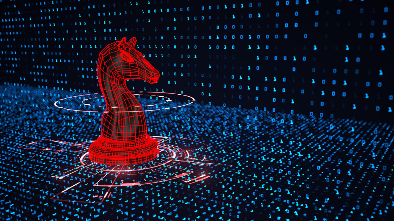 Ein trojanisches Pferd, das einen Hacker symbolisiert, dringt in ein Computersystem ein. Die israelische Firma Team Jorge soll weltweit Wahlmanipulation betrieben haben.