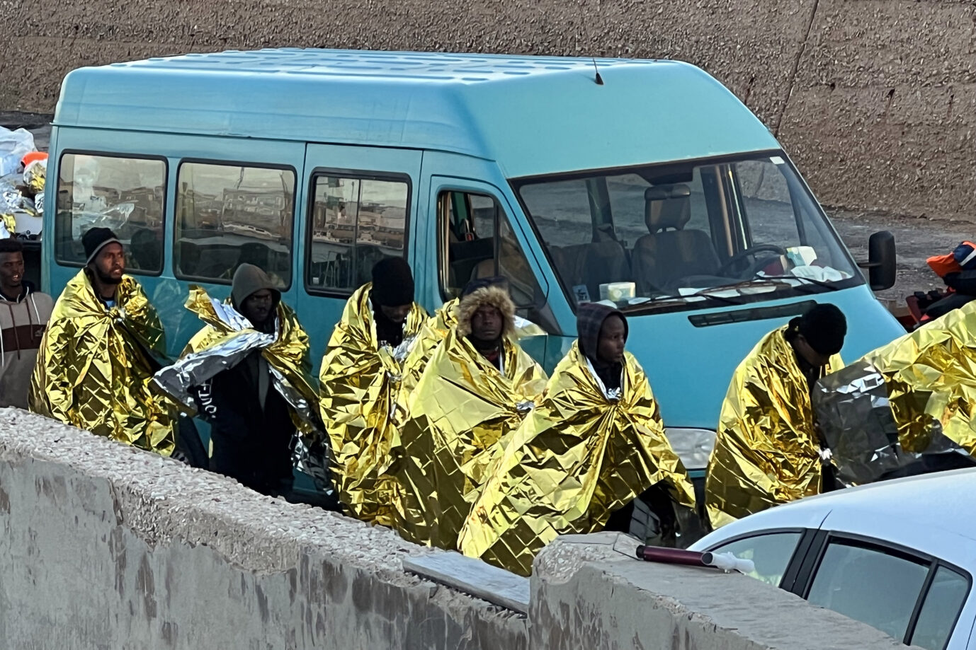 Bootsmigranten nachdem sie Lampedusa erreicht haben