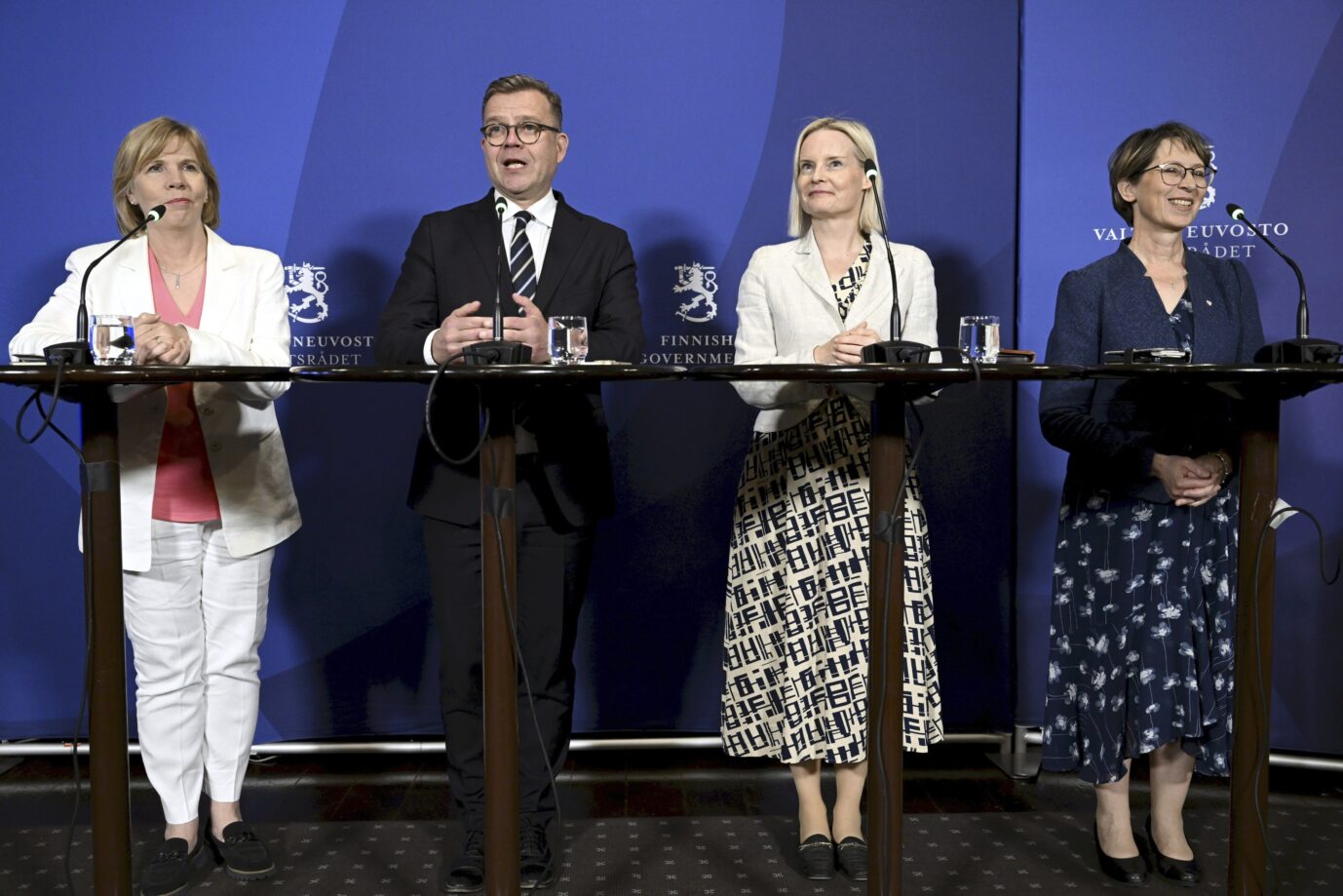 Die vier Parteivorsitzenden der neuen Mitte-rechts-Koalition in Finnland