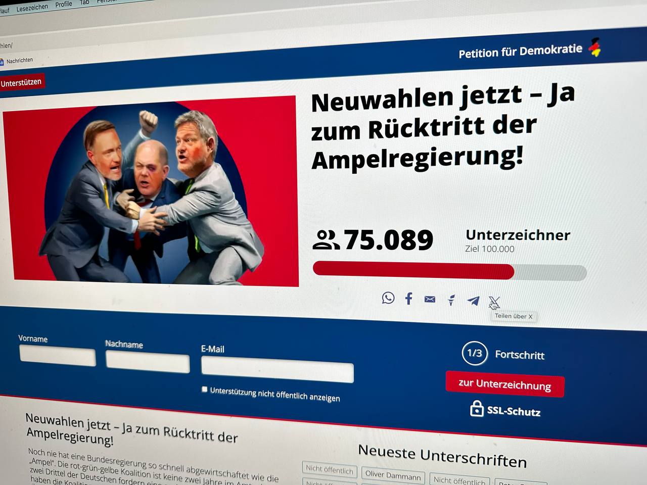 Bildschirm zeigt die Petition "Neuwahlen jetzt!" der Plattform petitionfuerdemokratie.de