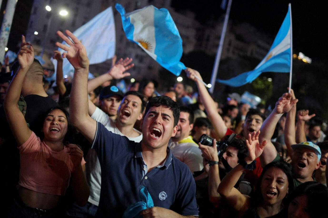 Supporters of Argentine president-elect Javier Milei celebrate the results of Argentina's runoff presidential election, in Buenos Aires, Argentina November 19, 2023. REUTERS/Cristina Sille