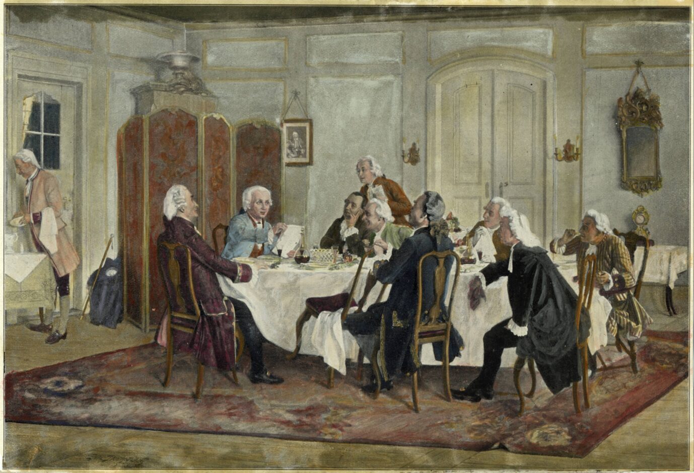 Kant sitzt mit seinen Tischgenossen am Esstisch und hält ein beschriebenes Stück Papier hoch, kolorierter Holzstich nach einem Gemälde von Emil Doerstling, 1900