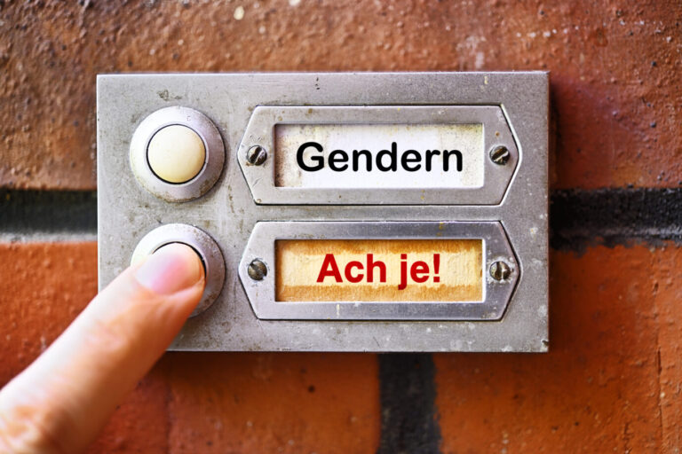 Ein Finger drückt auf eine Klingel, auf der "Gender" und "Ach je!" stehen