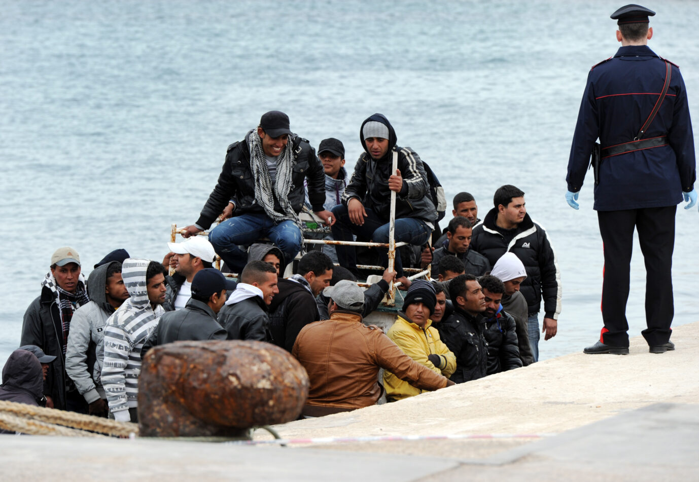 Tunisian immigrants land on the Italian island of Lampedusa on march 15, 2011. The migrants had to be rescued by coast guards near the island as their vessel risked sinking. Lampedusa has been swamped by thousands of arrivals in recent weeks and the local 850-bed immigrant centre is severely overcrowded. Photo by Eric Vandeville/ABACAPRESS.COM. Es geht um kriminelle Tunesier.