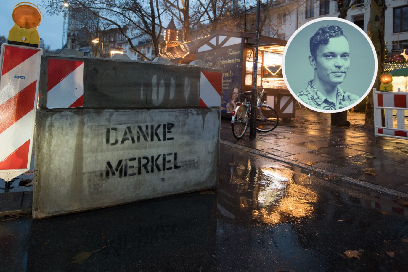 Ein Abgrenzungs-Poller mit einem Graffiti „Danke Merkel“ steht am 27.11.2017 an einer angrenzenden Straße neben dem Weihnachtsmarkt am Römerberg in Frankfurt am Main (Hessen). Der größte Weihnachtsmarkt in Hessen wird am 27.11.2017 eröffnet. Inzwischen sind Absagen von Volksfesten aus Sorge vor Terror Alltag in Deutschland. Foto: Fabian Sommer/dpa