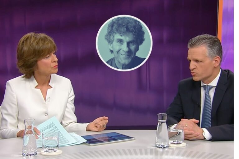 Zwei Personen – eine Frau in weißem Blazer und ein Mann im dunklen Anzug – sitzen sich in einem Fernsehstudio mit lila Hintergrund gegenüber und führen ein Gespräch. Auf dem Tisch vor ihnen liegen ein Tablet, Papierunterlagen sowie Gläser und Karaffen mit Wasser. Im oberen Bildzentrum ist ein kreisrundes Porträt eines älteren Mannes mit lockigem Haar eingeblendet, monochrom in Blaugrün gehalten. Moderatorin Maybrit Illner (links) und der CDU-Politiker Thorsten Frei (rechts) diskutieren in einer Fernsehsendung im Studio mit lila Hintergrund. Auf dem Tisch vor ihnen liegen Unterlagen, ein Tablet sowie Gläser und Karaffen mit Wasser. Im oberen Bildzentrum ist ein kreisrundes Porträt des Journalisten und JF-Autors Ulrich Clauß eingeblendet, monochrom in Blaugrün gehalten. Die Union will offenbar im Streit um die Wahl der links-aktivistischen Richterkandidatin Frauke Brosius-Gersdorf nachgeben. Zweifel an ihrer Doktorarbeit seien „ausgeräumt“, meint Kanzleramtsminister Thorsten Frei bei Maybrit Illner – obwohl die Uni-Hamburg „hinreichenden Hinweisen“ auf Plagiate nachgeht.