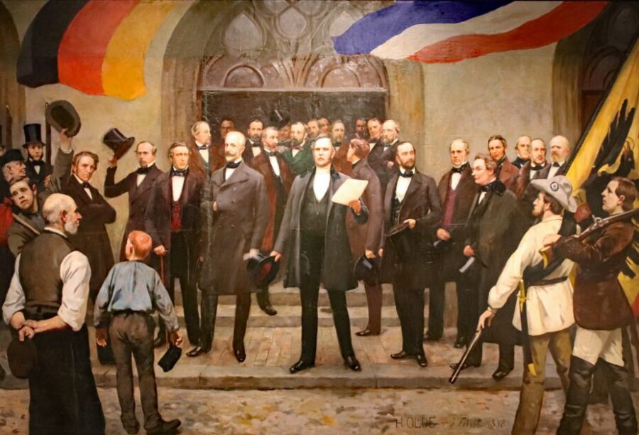 Dänemarks Geschichte: Proklamation der Provisorischen Regierung Schleswig-Holsteins am 24. März 1848 vor dem Kieler Rathaus; Druck nach einem Gemälde von Hans Olde und Julius Fürst, 1898.