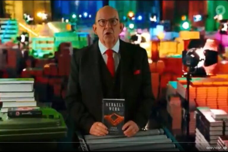 Dennis Scheck in der ARD bei seiner Haßtirade gegen das kritische Buch „Merkels Werk“.