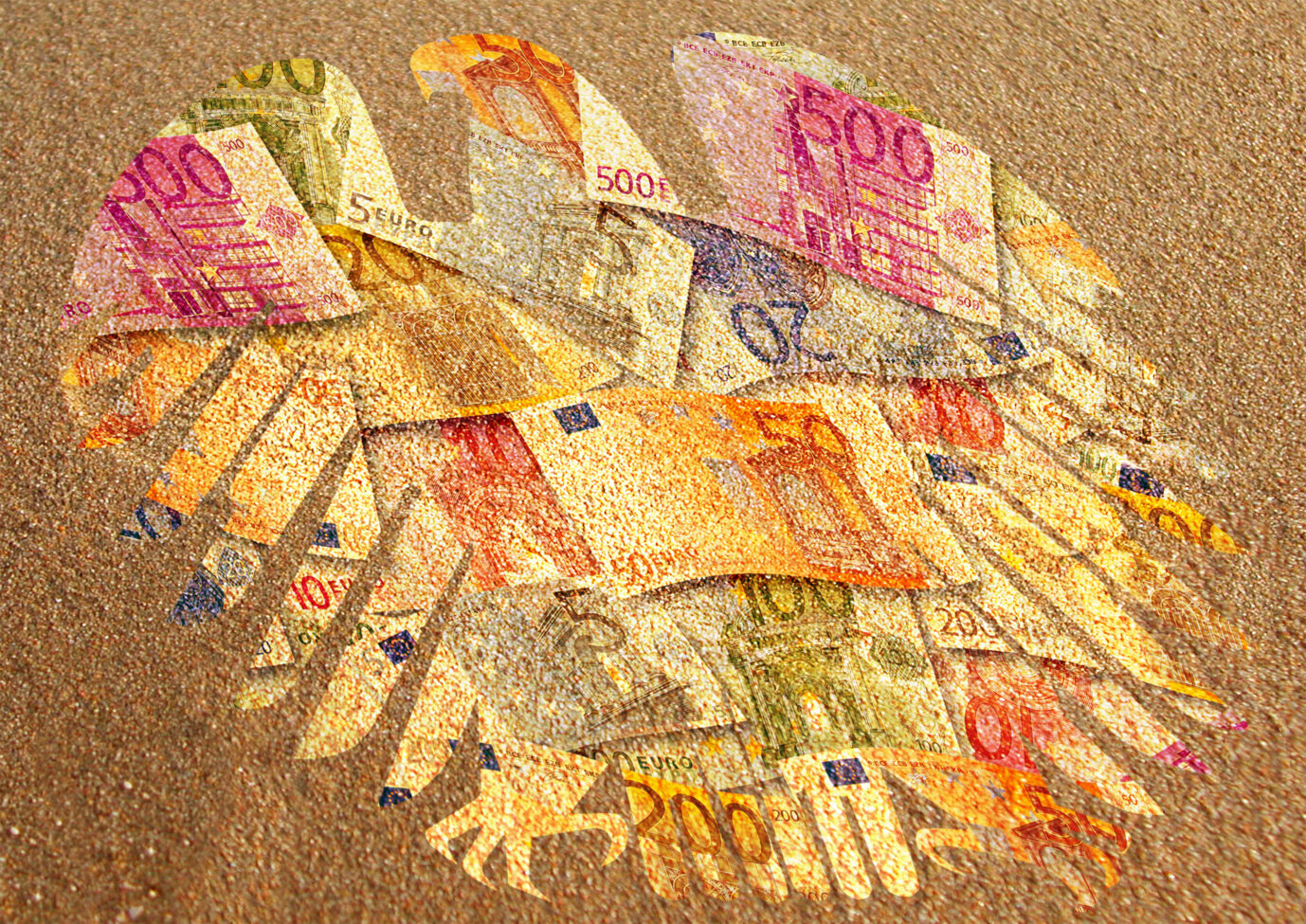 Bundesadler mit Eurogeldscheinen verfremdet (Symbolbild): Sind die Eurobonds und vergemeinschafteten Schulden schon Realität? Foto: picture alliance / FotoMedienService | Ulrich Zillmann