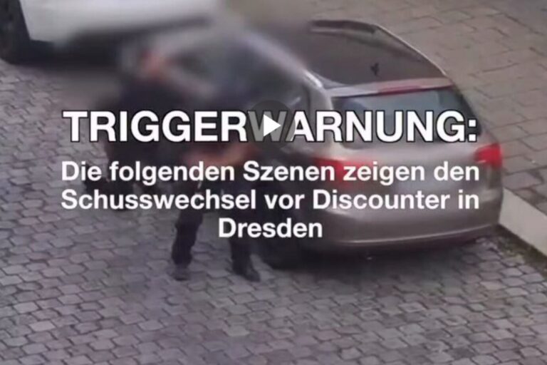 Das Bild zeigt einen Screenshot aus einem Video, in dem ein Türke vor einem Supermarkt „Allahu Akbar“ ruft und auf Polizisten schießt.
